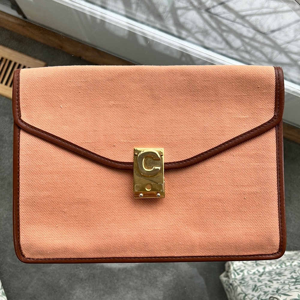 Celine Vintage Canvas and Leather Clutch. Never worn. New.